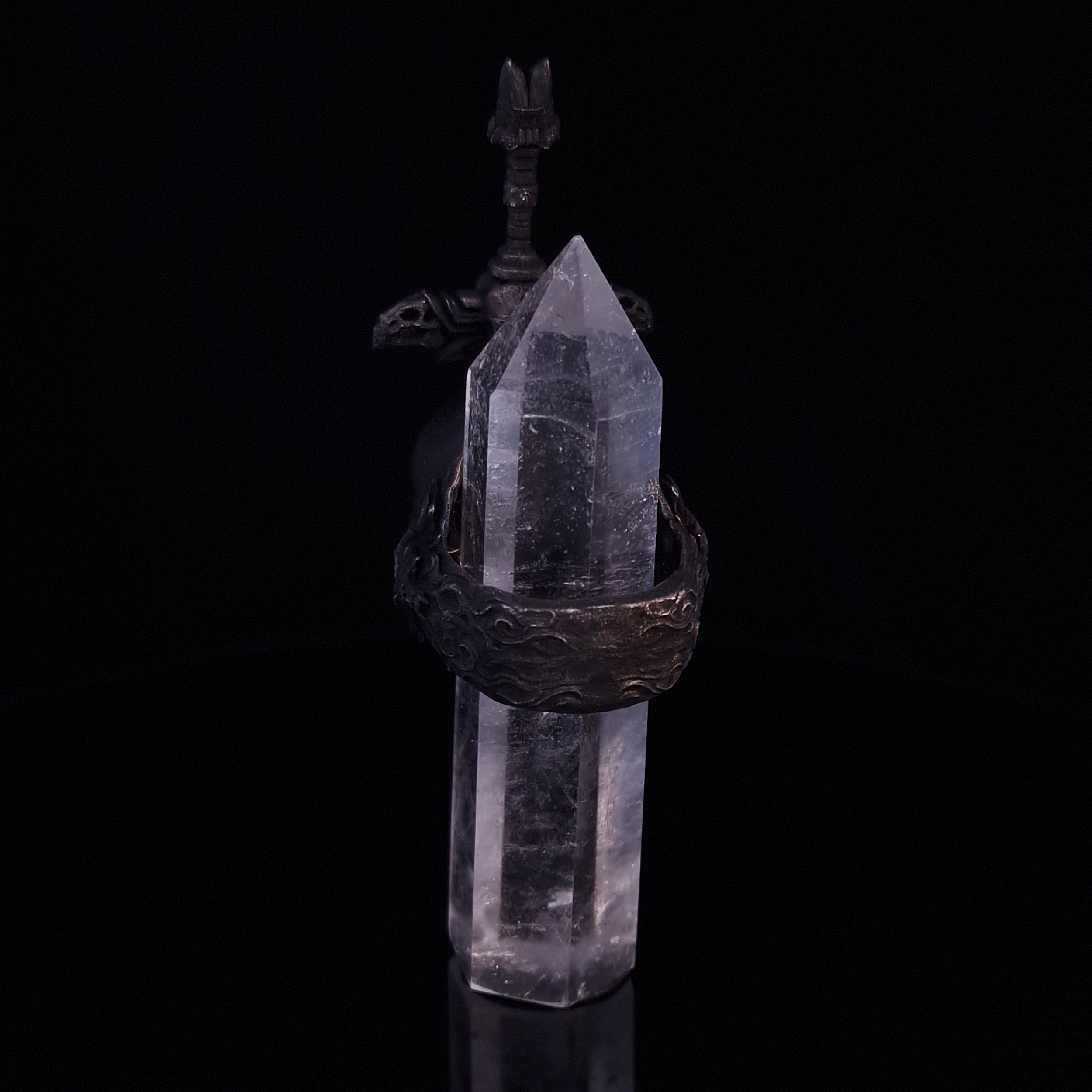 Rear view of the Adversarius Mortis ring in the Revenant 2 finish, with crystal support visible, focusing on the intricate band design.