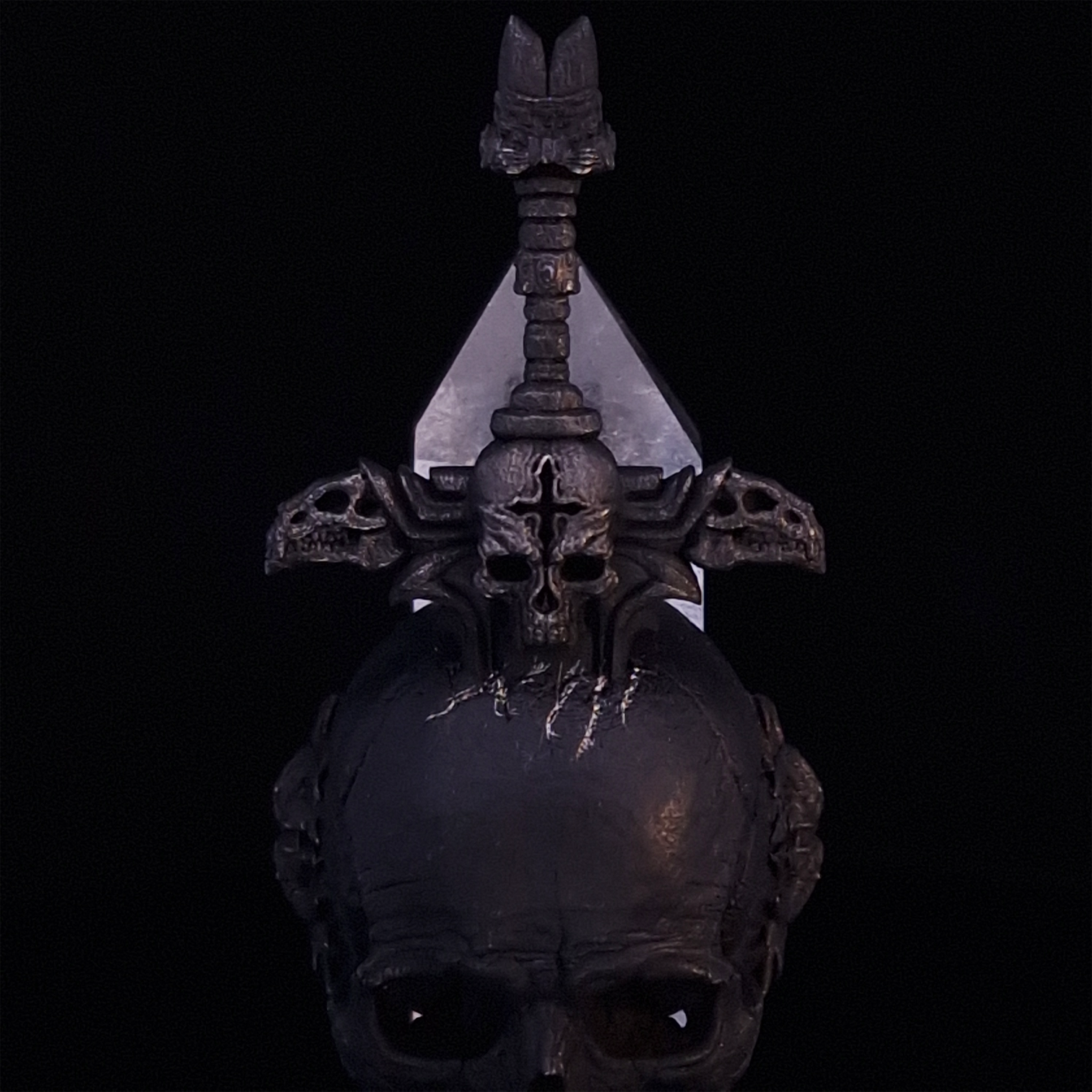 Front-facing close-up view of the Adversarius Mortis ring in the Revenant 2 finish, focusing on the design of the sword handle.