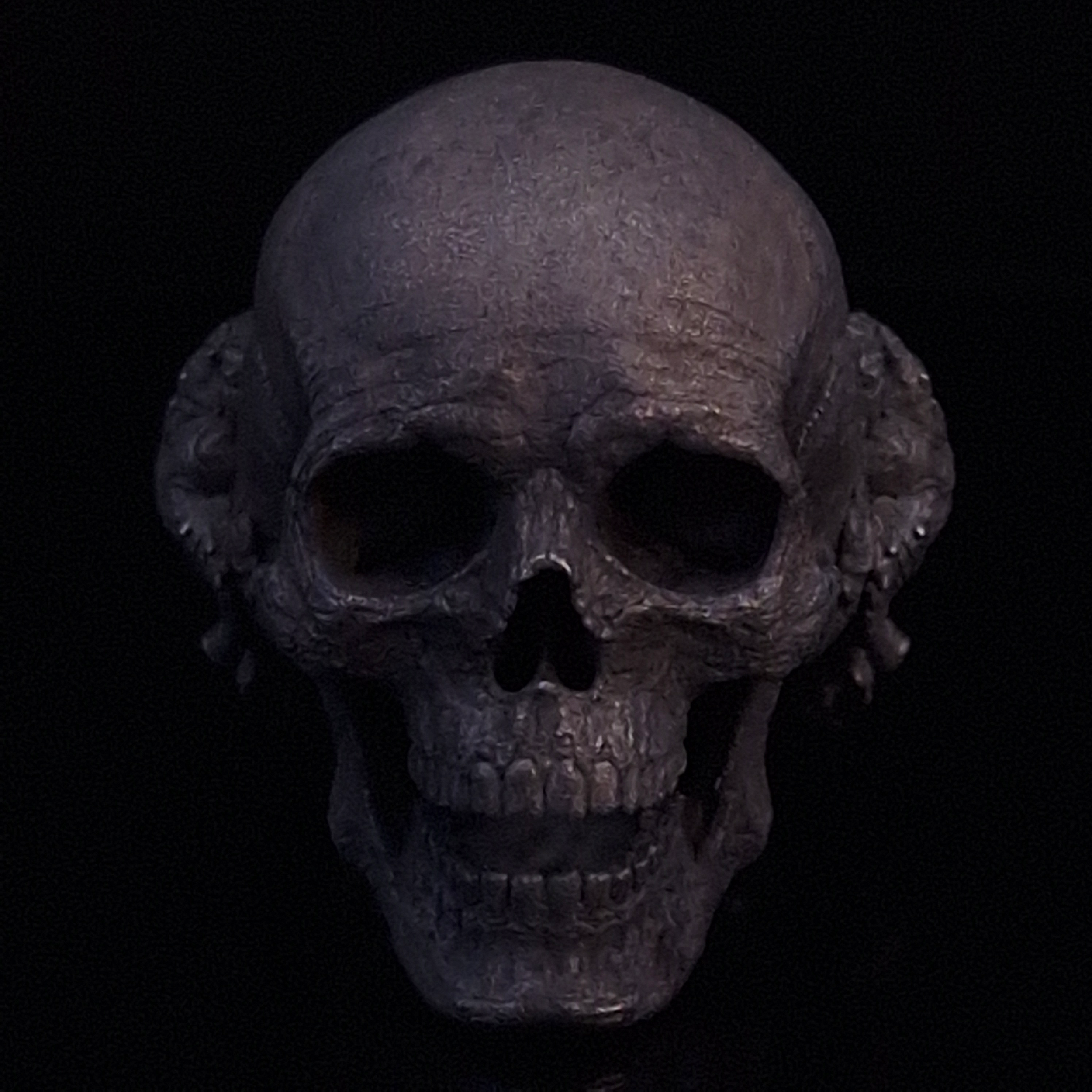 Front-facing view of the Nexus Mortis ring in the Revenant 3 finish, displayed on a turntable against a black background.