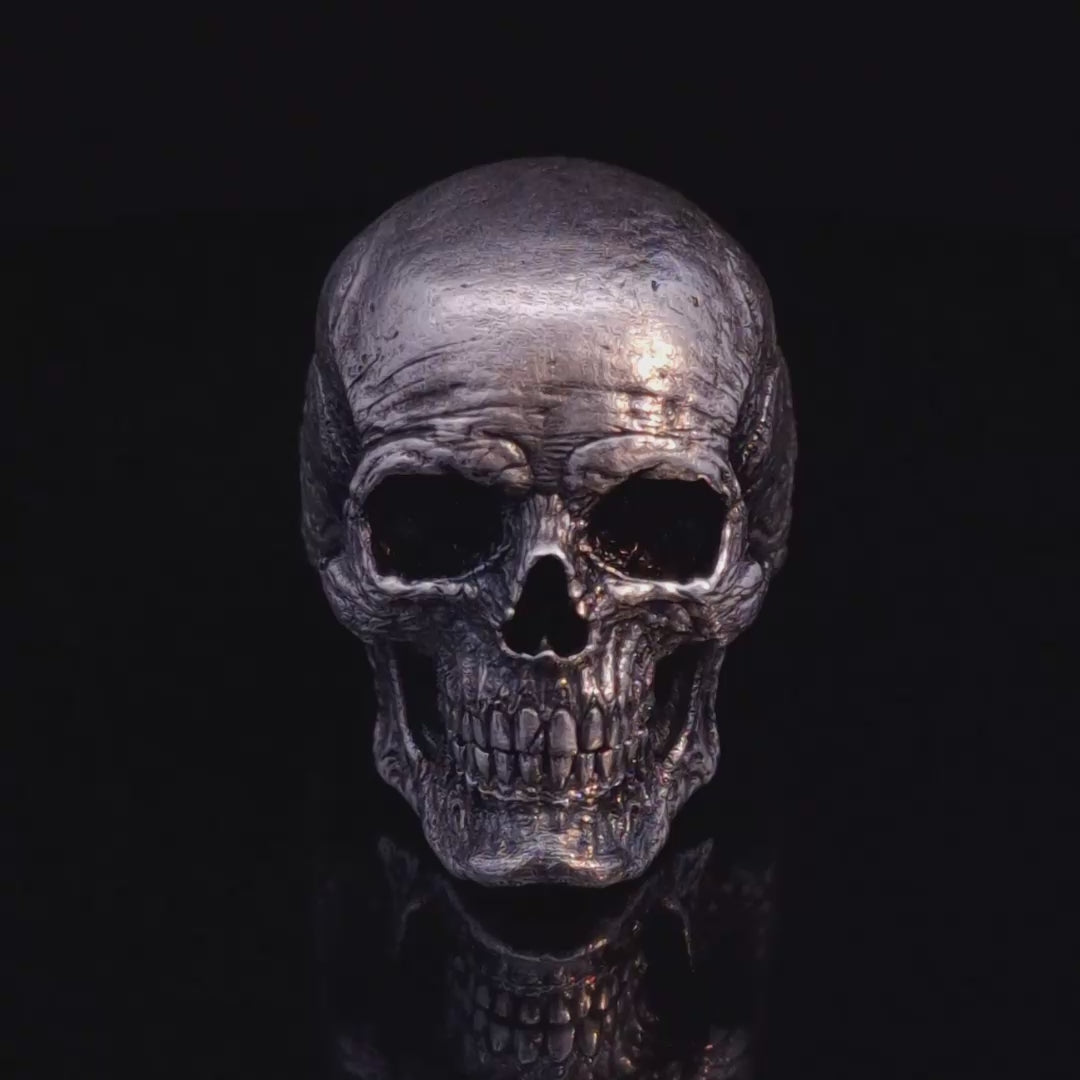 Video of the Invidia Mortis in the Fallen finish slowly rotating on a turntable, showcasing every angle against a black background.