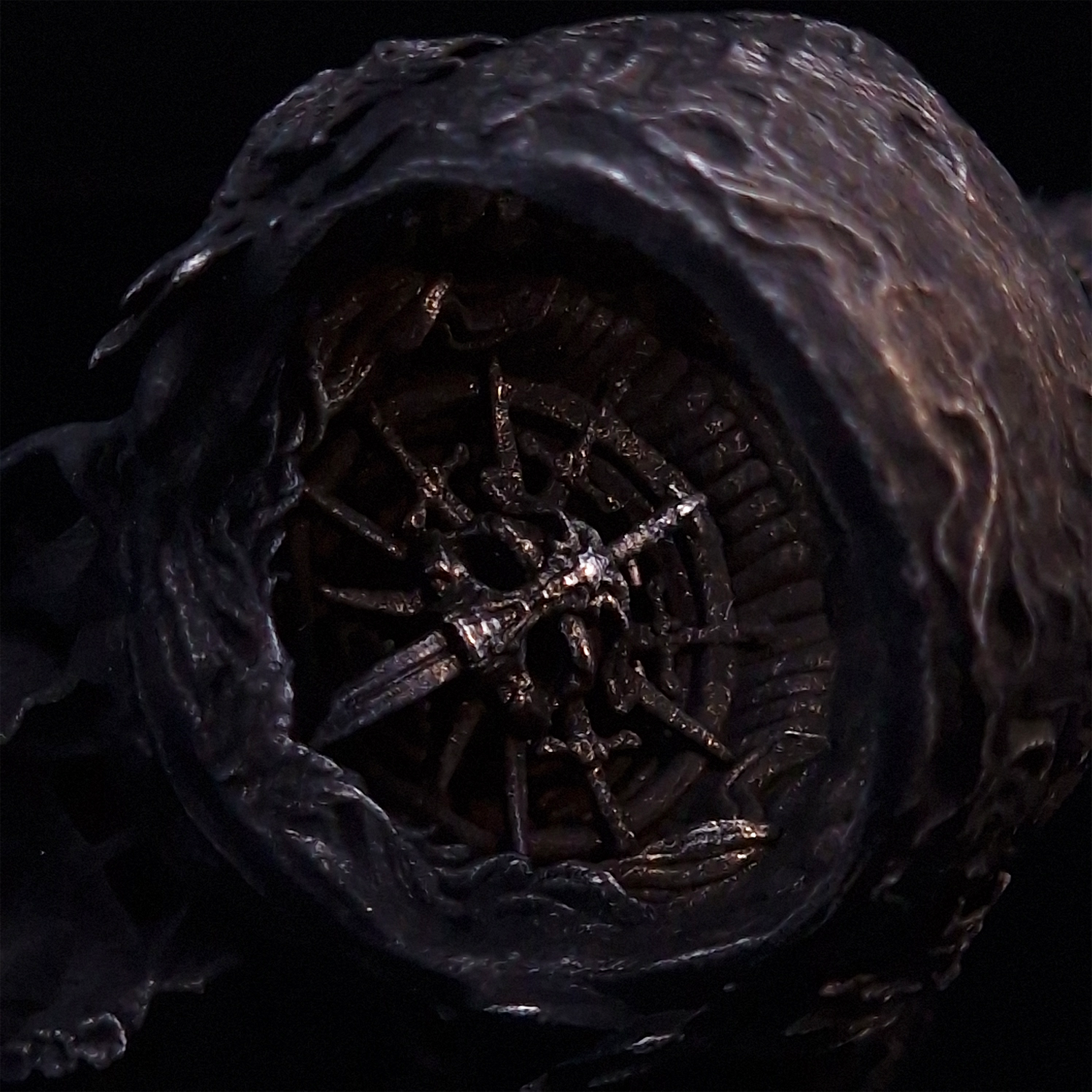 Close-up of the inner design of the Adversarius Mortis ring in the Revenant 2 finish, against a black backdrop.