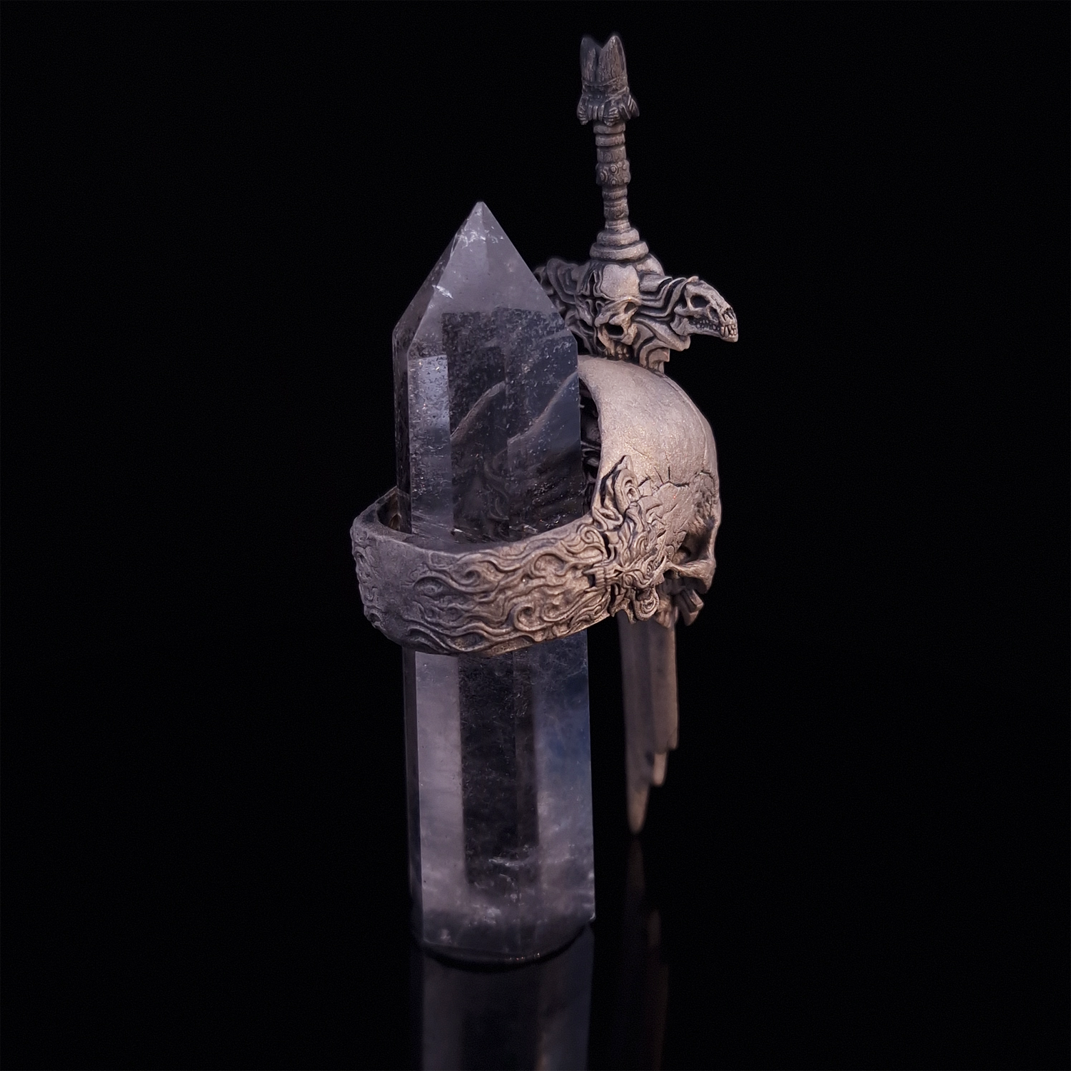 Rear-right view of the Adversarius Mortis ring in the Wraith finish, with crystal support visible, focusing on the intricate band design.