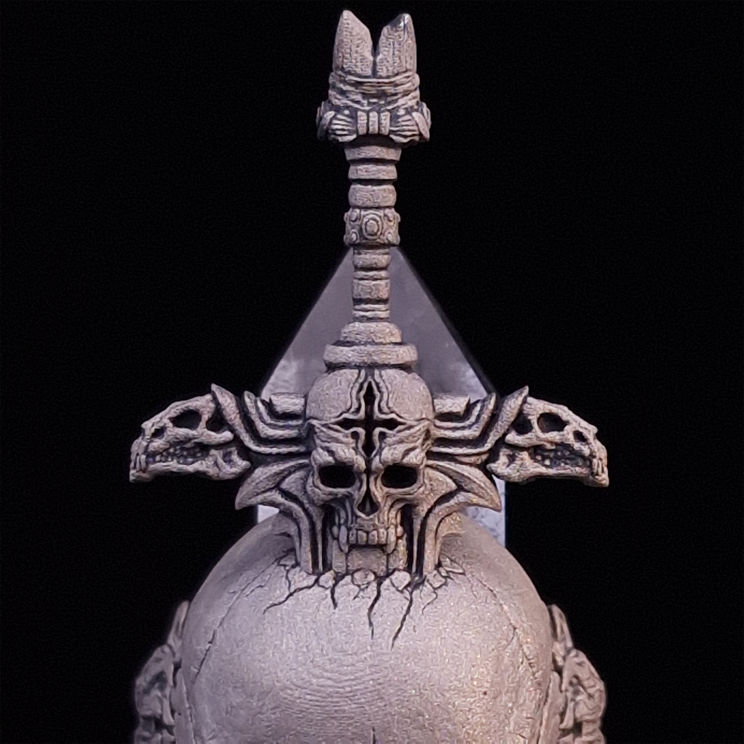 Front-facing close-up view of the Adversarius Mortis ring in the Wraith finish, focusing on the design of the sword handle.