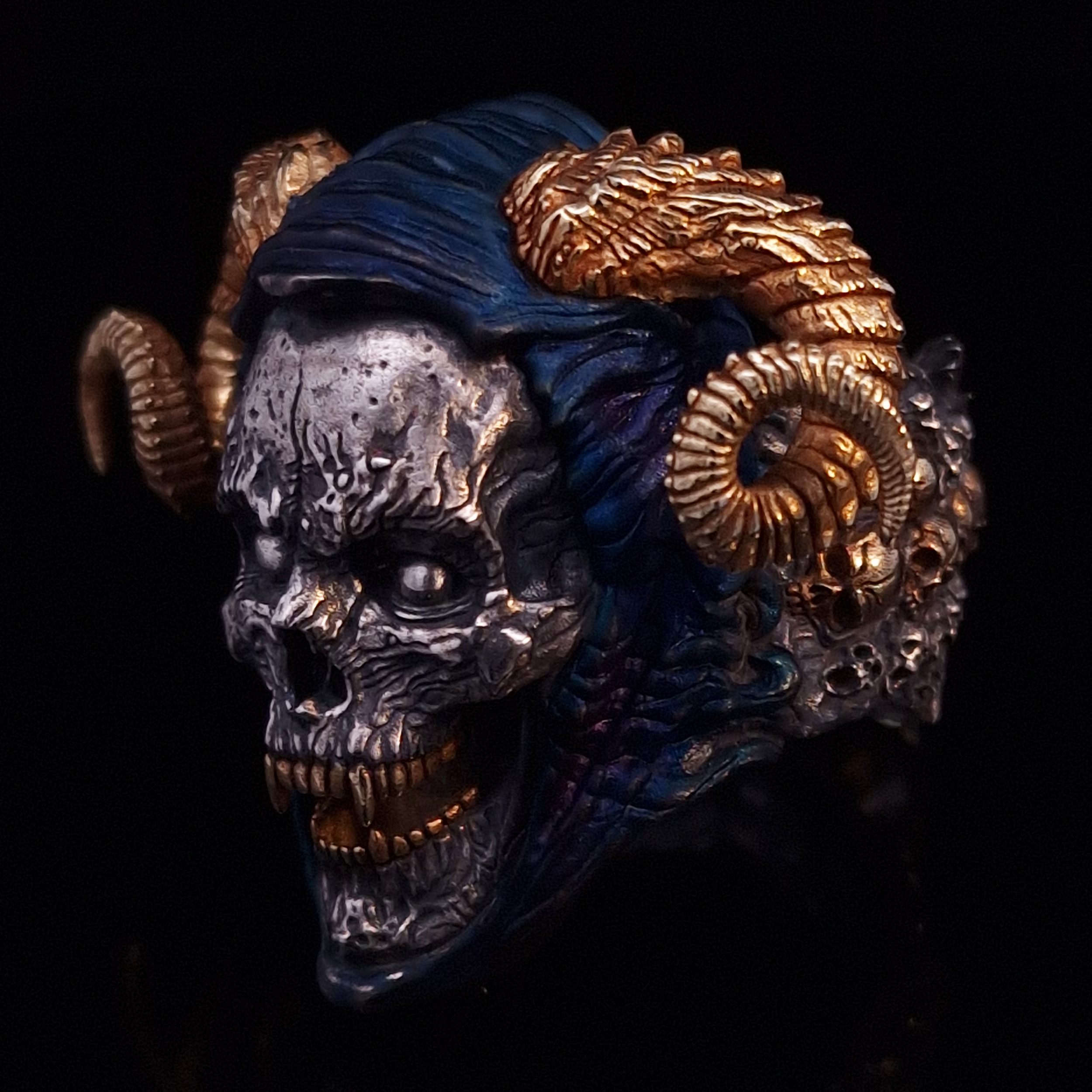 Front-left facing view of the Sword of Damocles ring in the Eternal finish, displayed on a turntable against a black background.