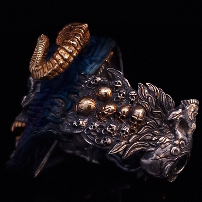 Left-facing close-up view highlighting the detailed souls on the Sword of Damocles ring in the Eternal finish, shown on a turntable with a black background.