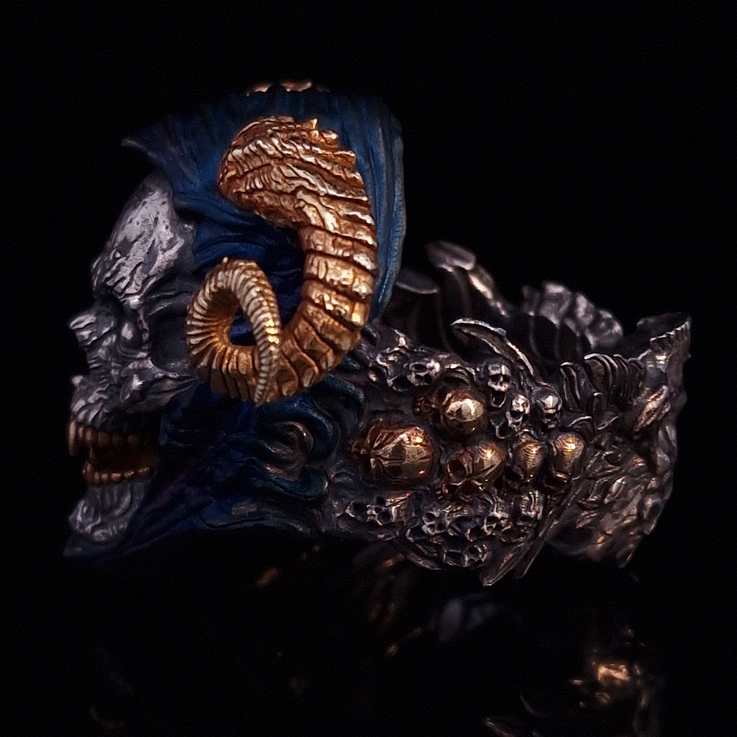 Left-facing side view highlighting the detailed band of the Sword of Damocles ring in the Eternal finish, shown on a turntable with a black background.