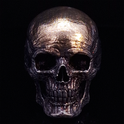Front-facing view of the Invidia Mortis ring in the Revenant 1 finish, displayed on a turntable against a black background.