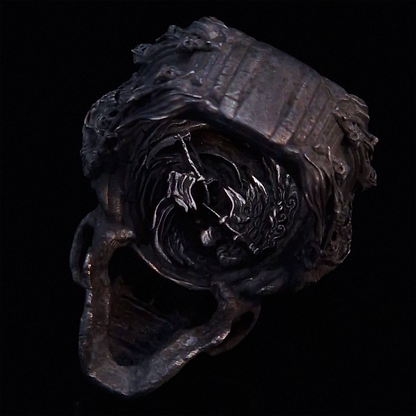 Back view of the Nexus Mortis ring in the Revenant 3 finish, captured on a turntable with a black backdrop.